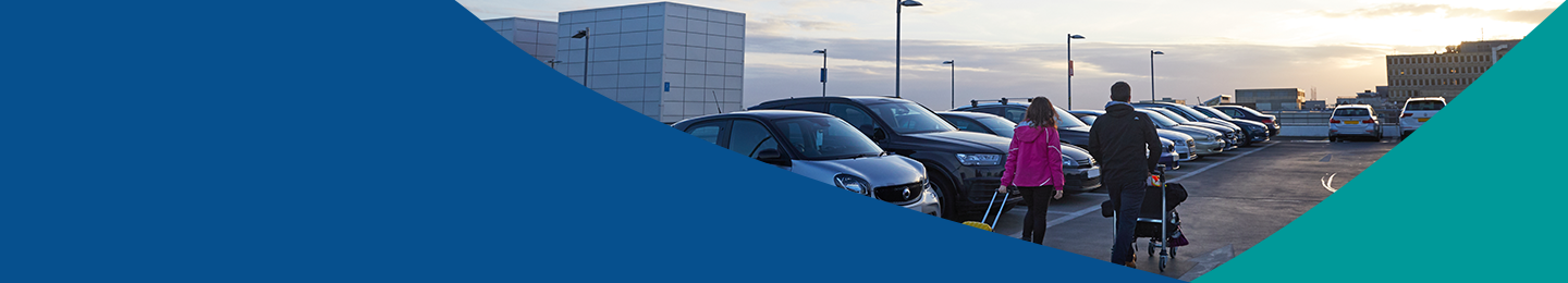 Banner image showing two passengers walking in a short stay car park